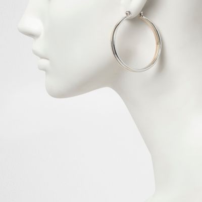 Rose gold and silver tone hoop earrings